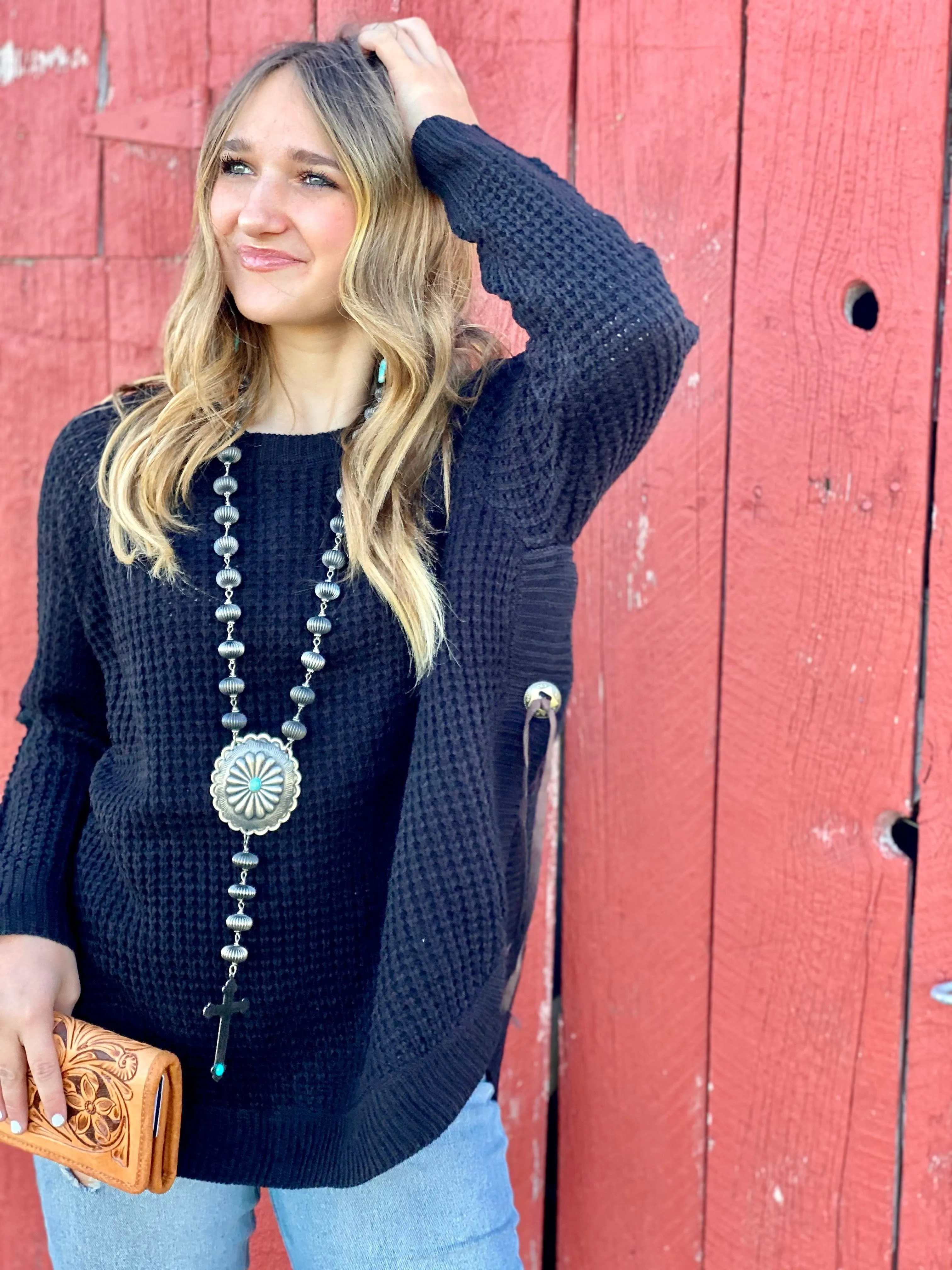 The Sleigh Bells Black Poncho Sweater