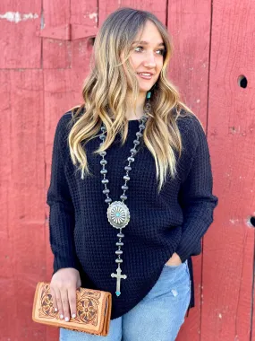 The Sleigh Bells Black Poncho Sweater